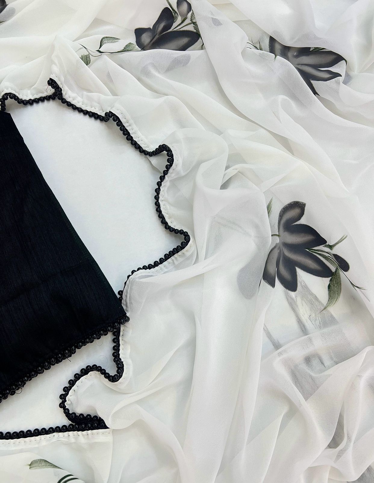 Georgette Floral Saree with Black Pearl Lace & Contrast Art Silk Blouse