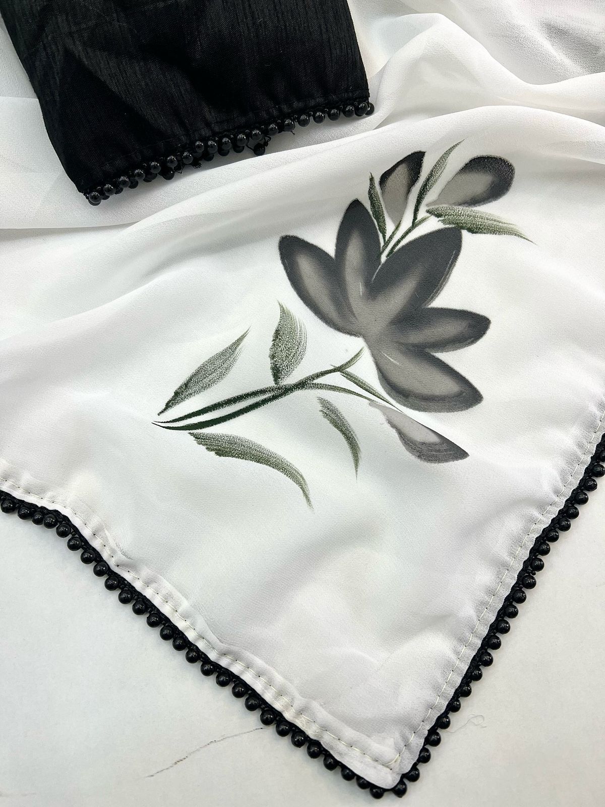 Georgette Floral Saree with Black Pearl Lace & Contrast Art Silk Blouse